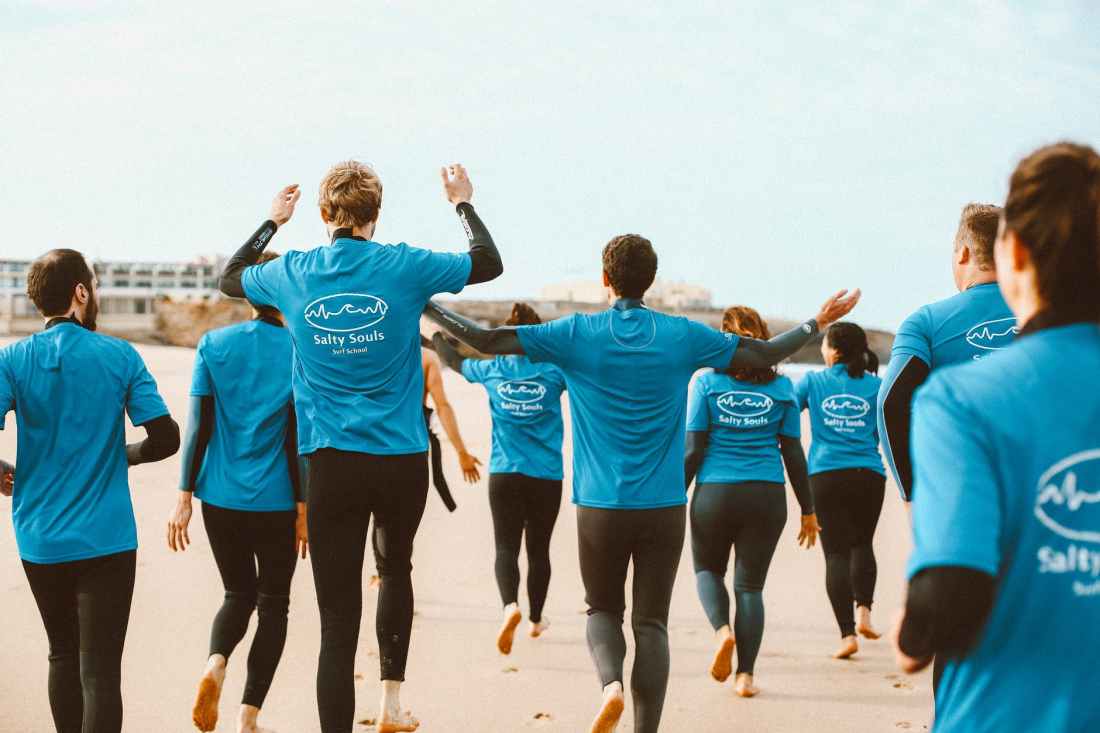 people walking on shore